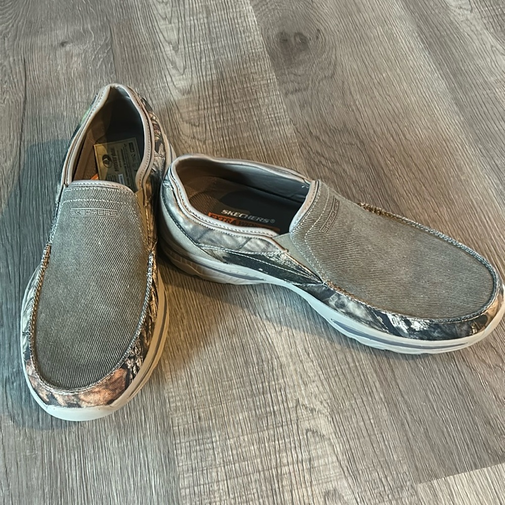 Men’s camo Skechers slip on shoes.